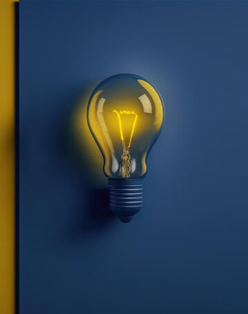 ilustracion-bombilla-luz-amarilla-sobre-fondo-azul-oscuro-concepto-creatividad-ia-generativa